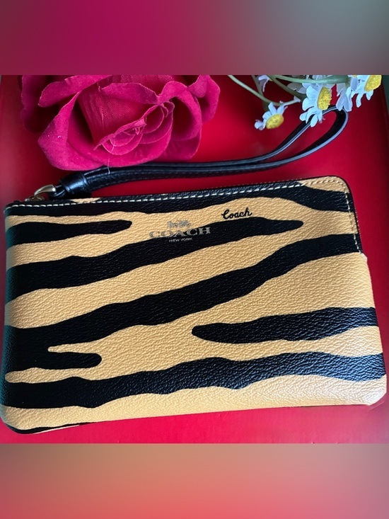 Coach Handbags - Coach Tiger Stripe Wristlet - Black & Tan
